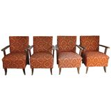 Set of 4 multicoloured mid-century armchairs in fabric and wood, 1950s.