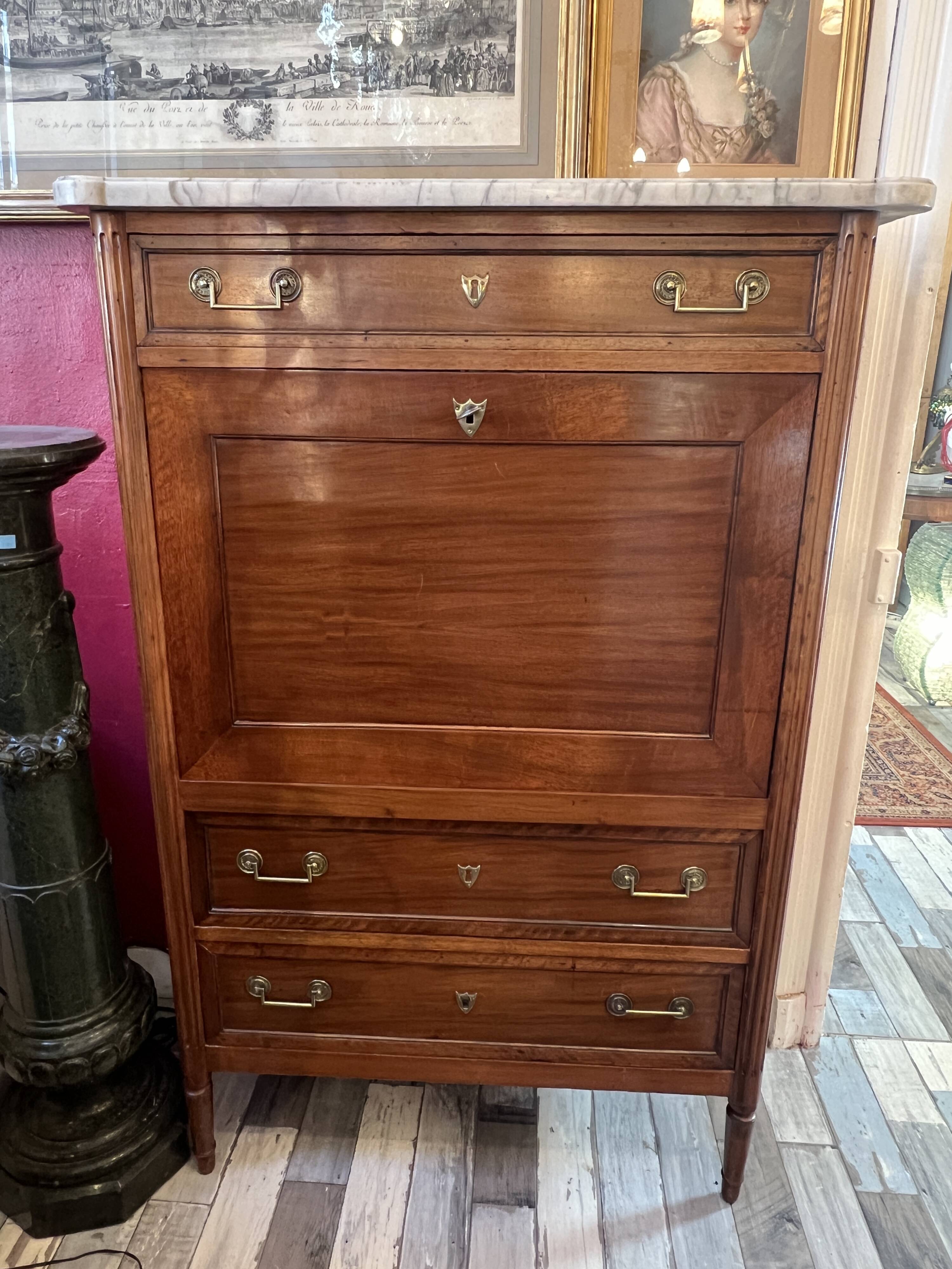 Louis XVI period mahogany secretary, white marble top, clover lock