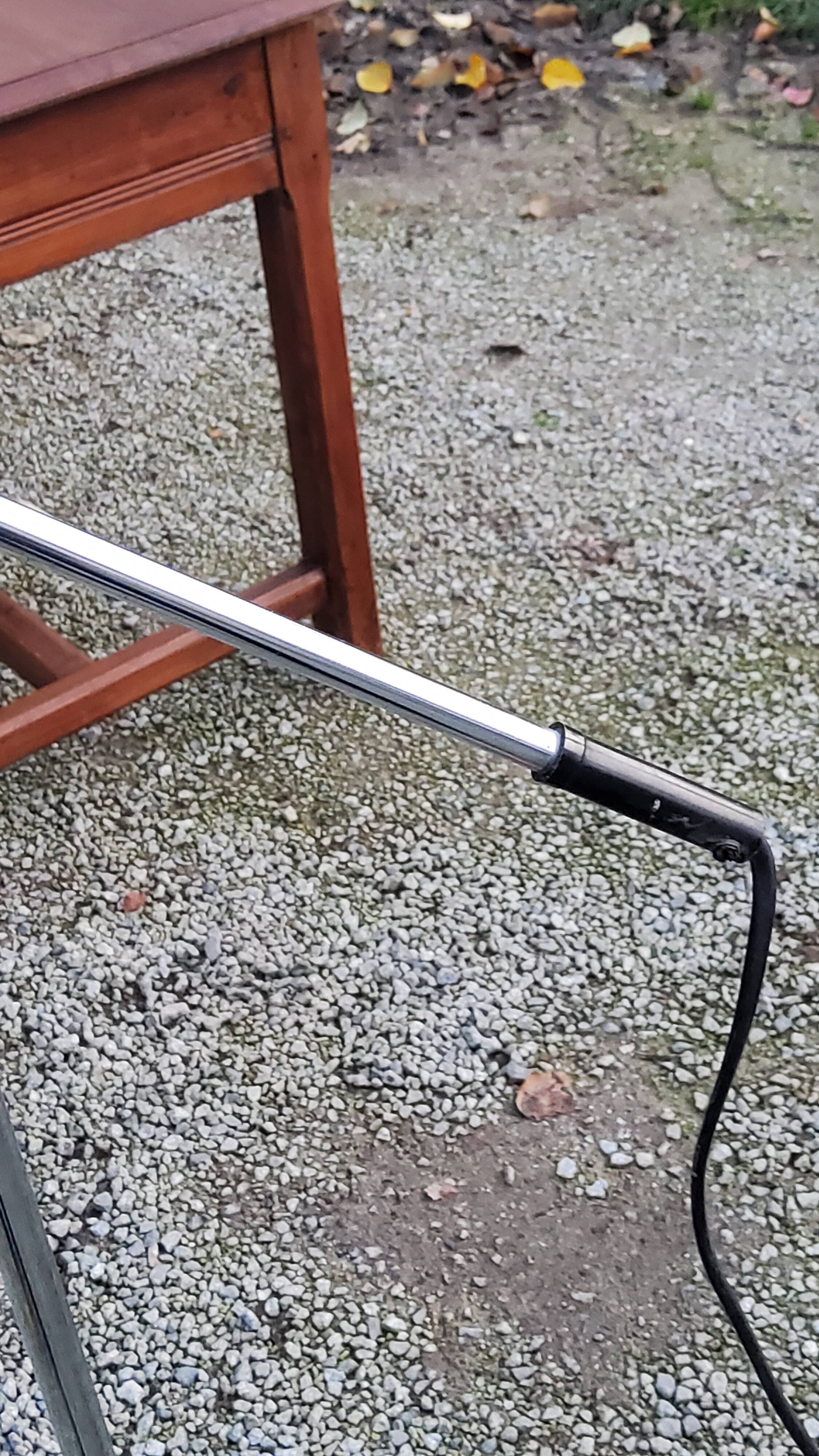 Designer reading lamp from the 70s in chrome and red lacquered sheet metal