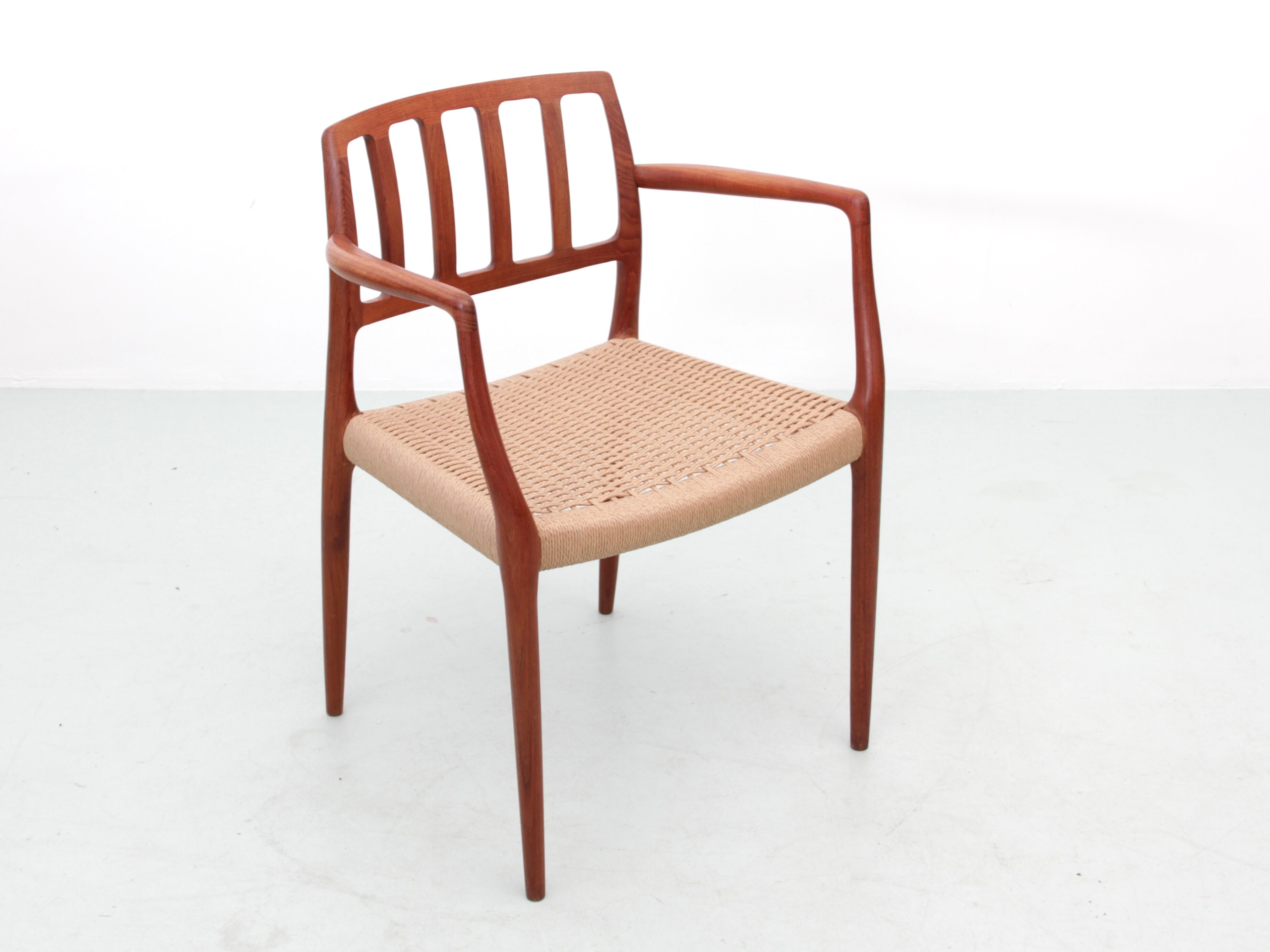 Suite of 4 Scandinavian teak armchairs model 66