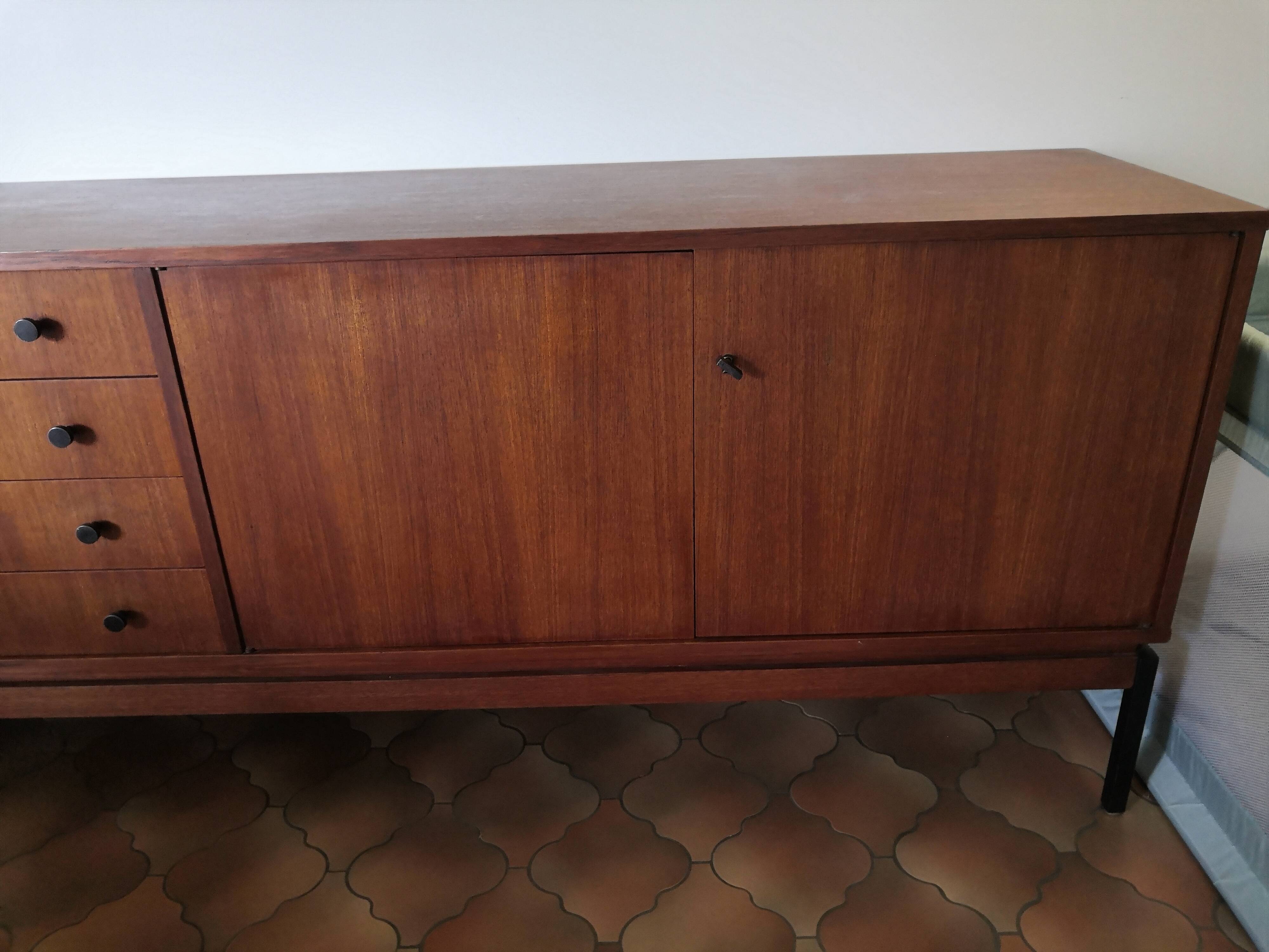 Vintage teak row with metal legs