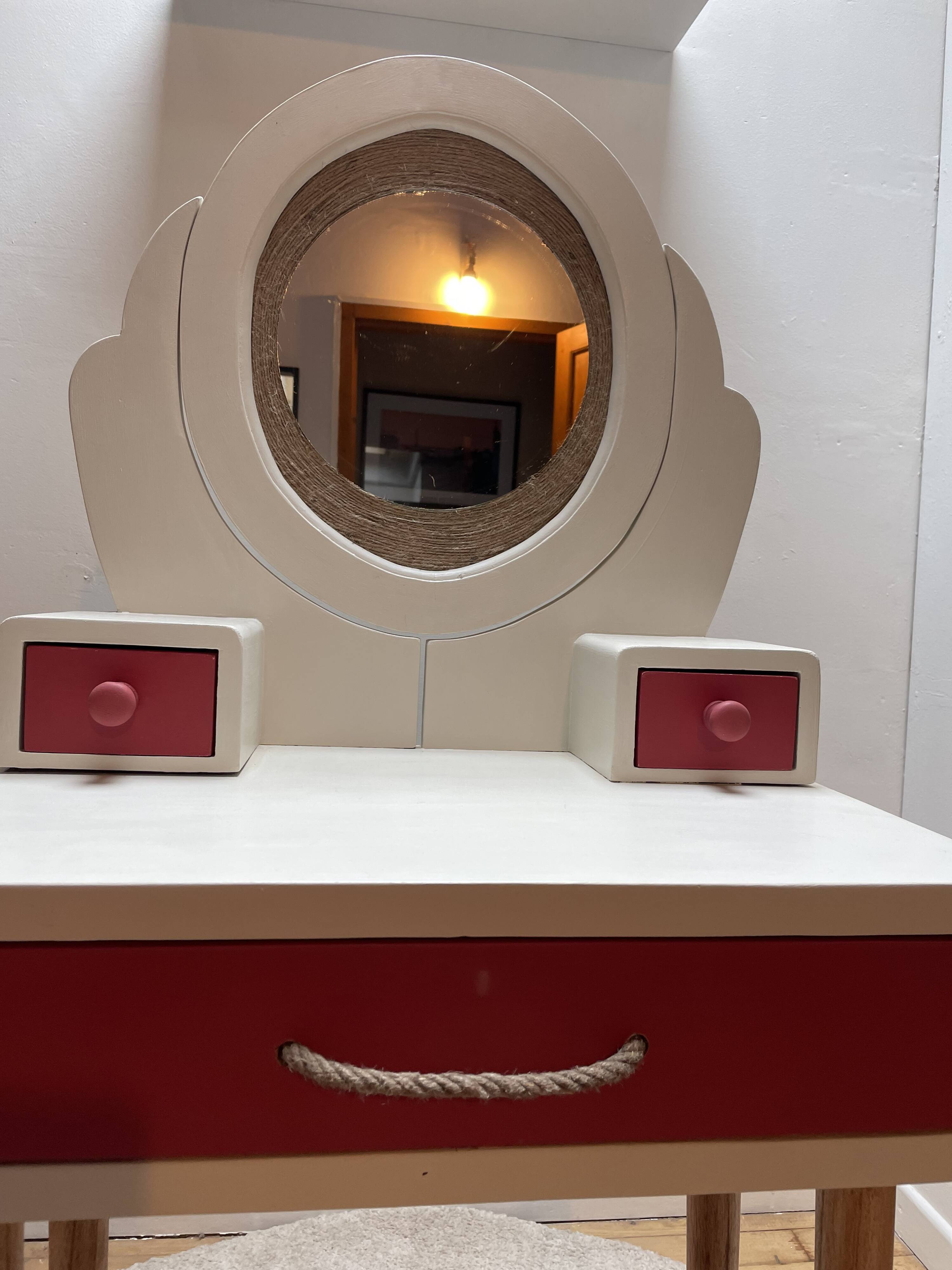 Wooden dressing table with beige and red baroque style mirror