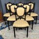 Dining room set consisting of a table and six chairs from the Napoleon III period.