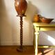Antique pedestal table with a twisted column.