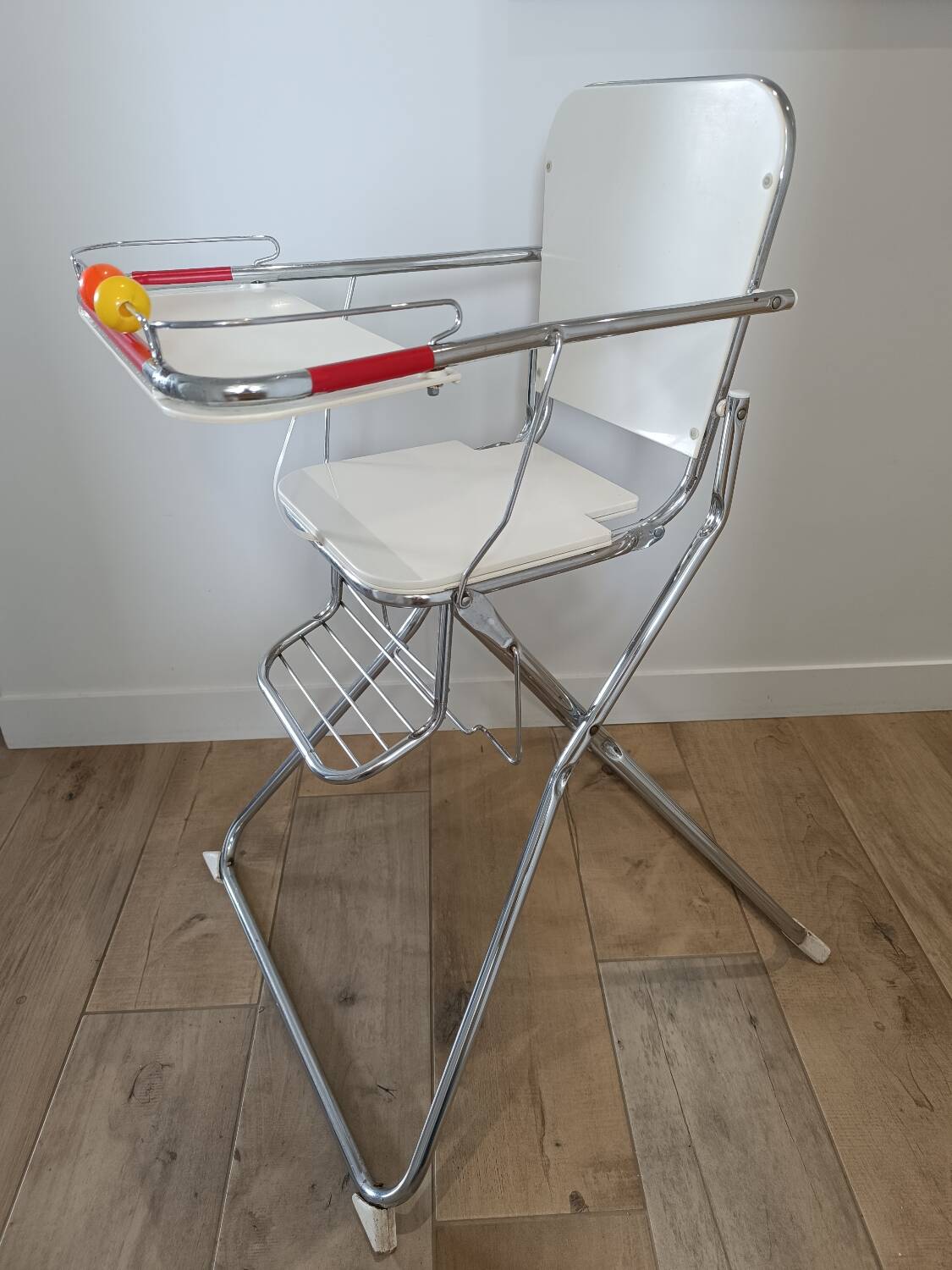 Vintage chrome and plastic baby high chair