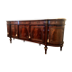 A mahogany buffet varnished with marble and bronze