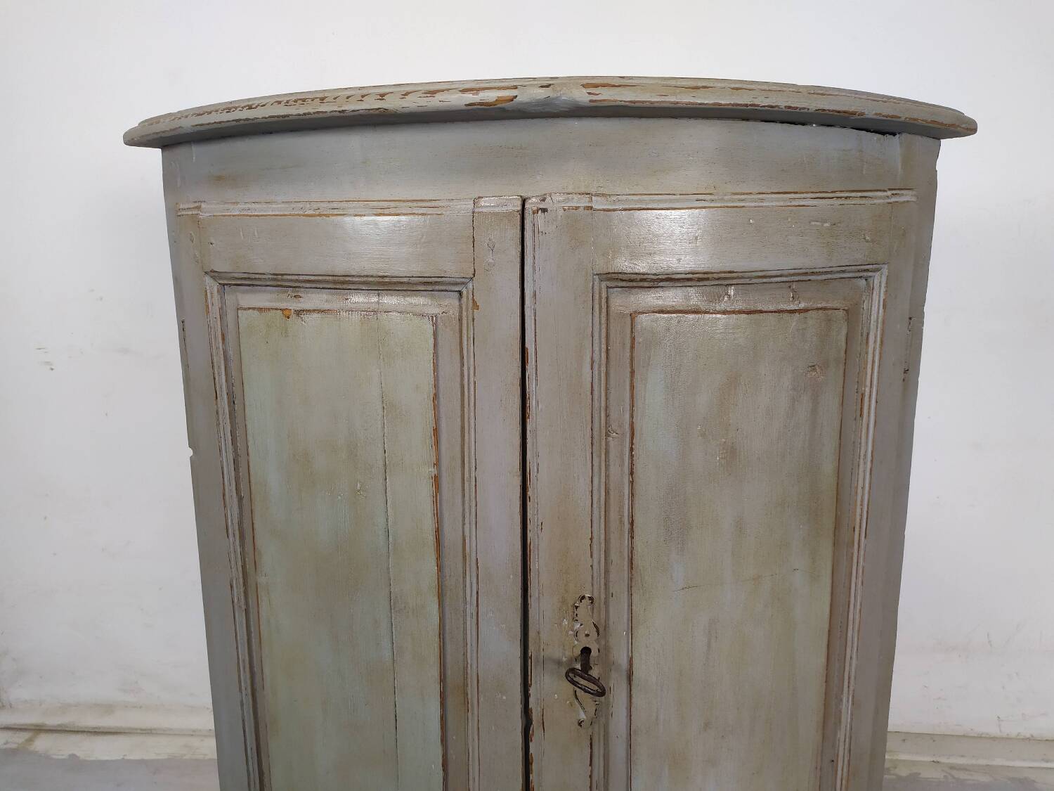 Rustic patinated corner cupboard