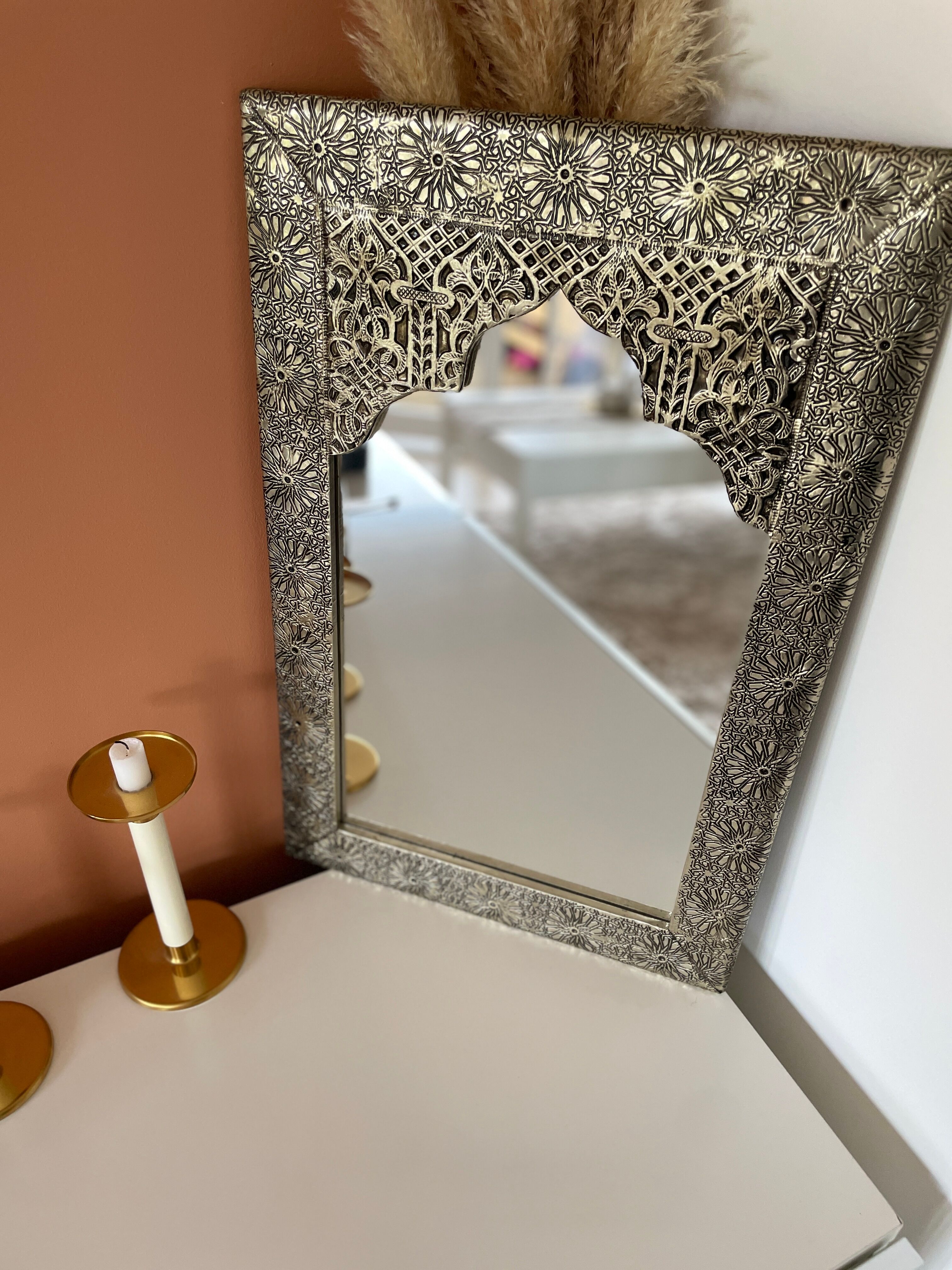 Silver oriental mirror