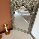 Silver oriental mirror
