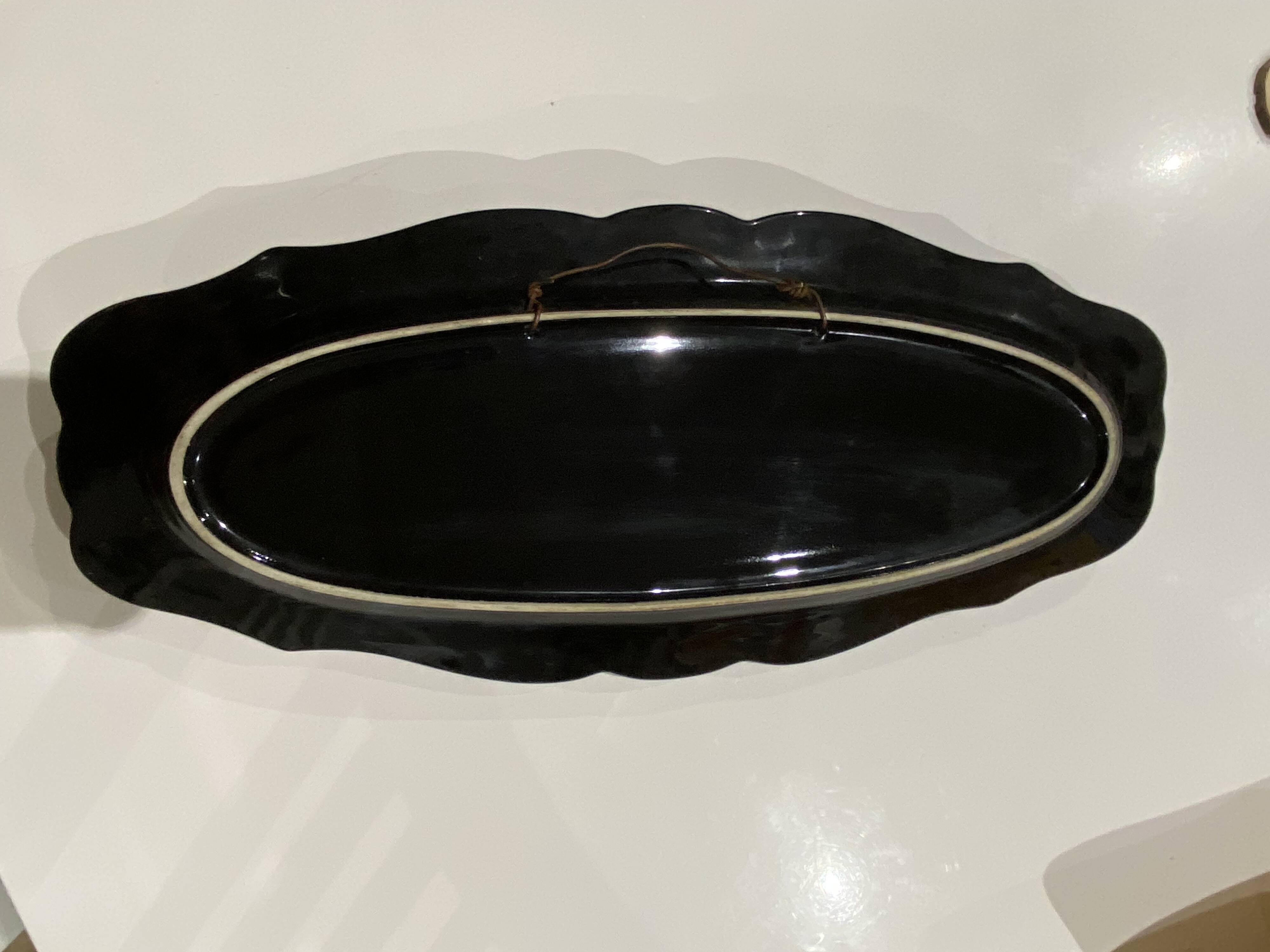 Large oval wall plate in Palissy majolica from Vallauris