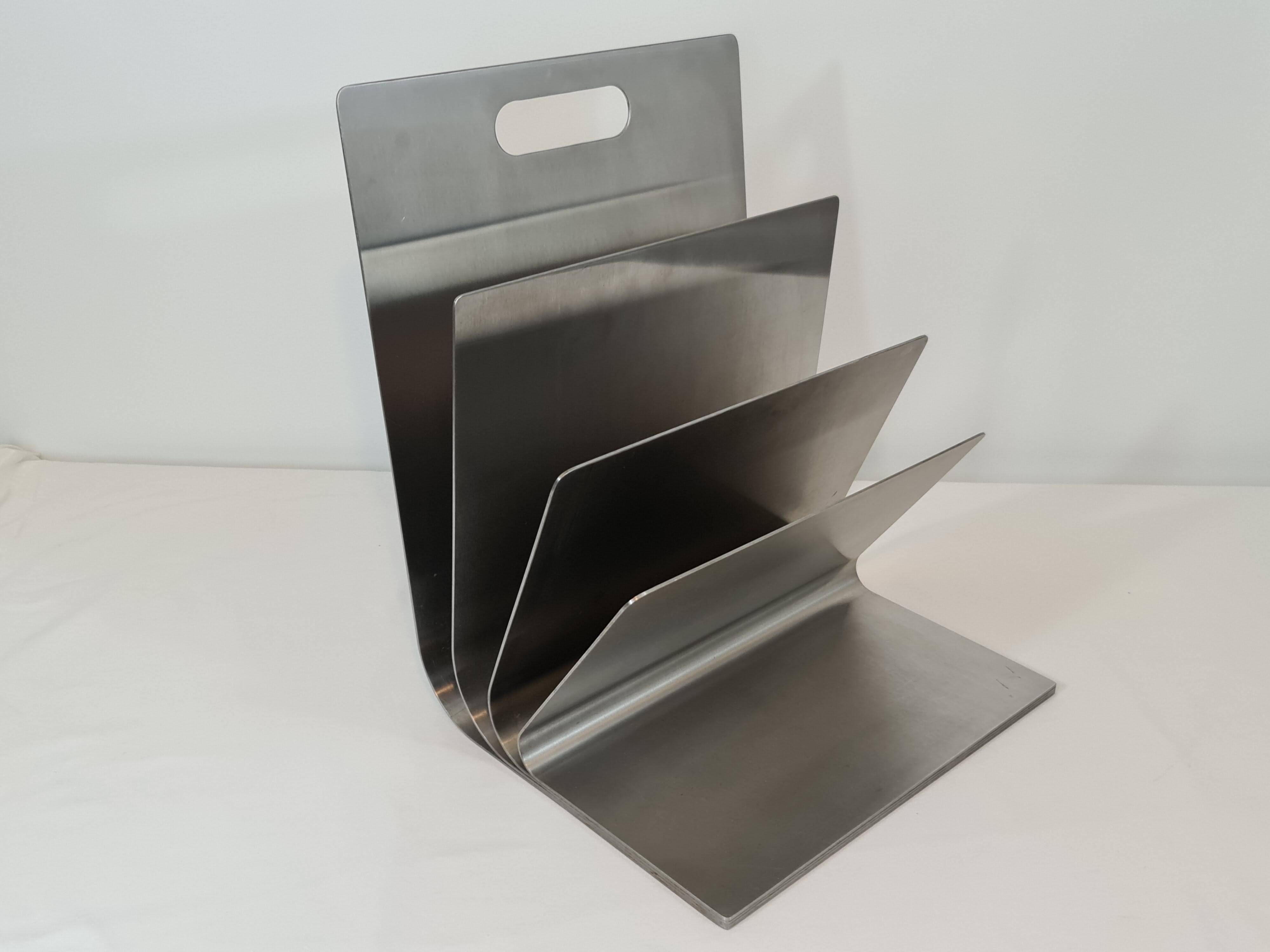 Stainless steel magazine rack by Xavier Féal for Inox Industrie 1970s