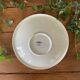 Large antique salad bowl on a pedestal, made of Sarreguemines earthenware.