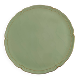 Large pastel green plate with a golden rim.