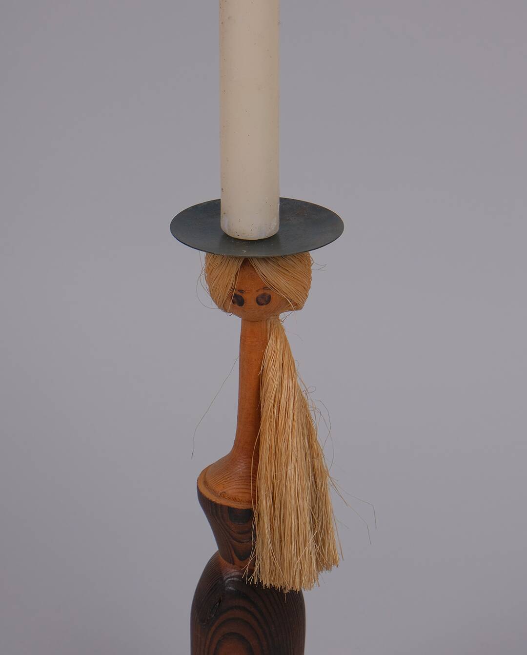 Anthropomorphic wooden candle holder