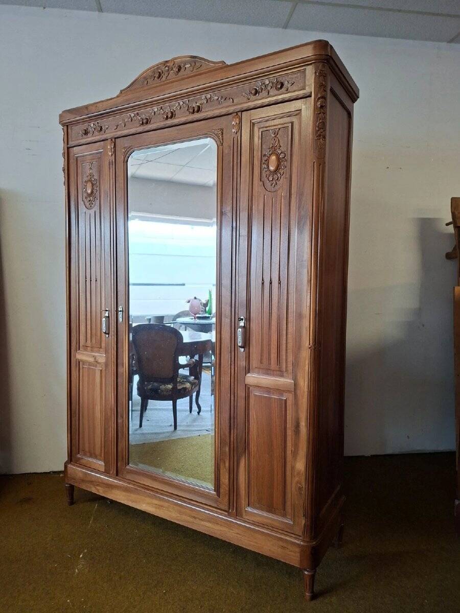 Louis XVI style wardrobe in solid walnut wood.