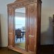 Louis XVI style wardrobe in solid walnut wood.