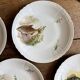 Set of 10 antique flat plates in porcelain, decorated with fish.