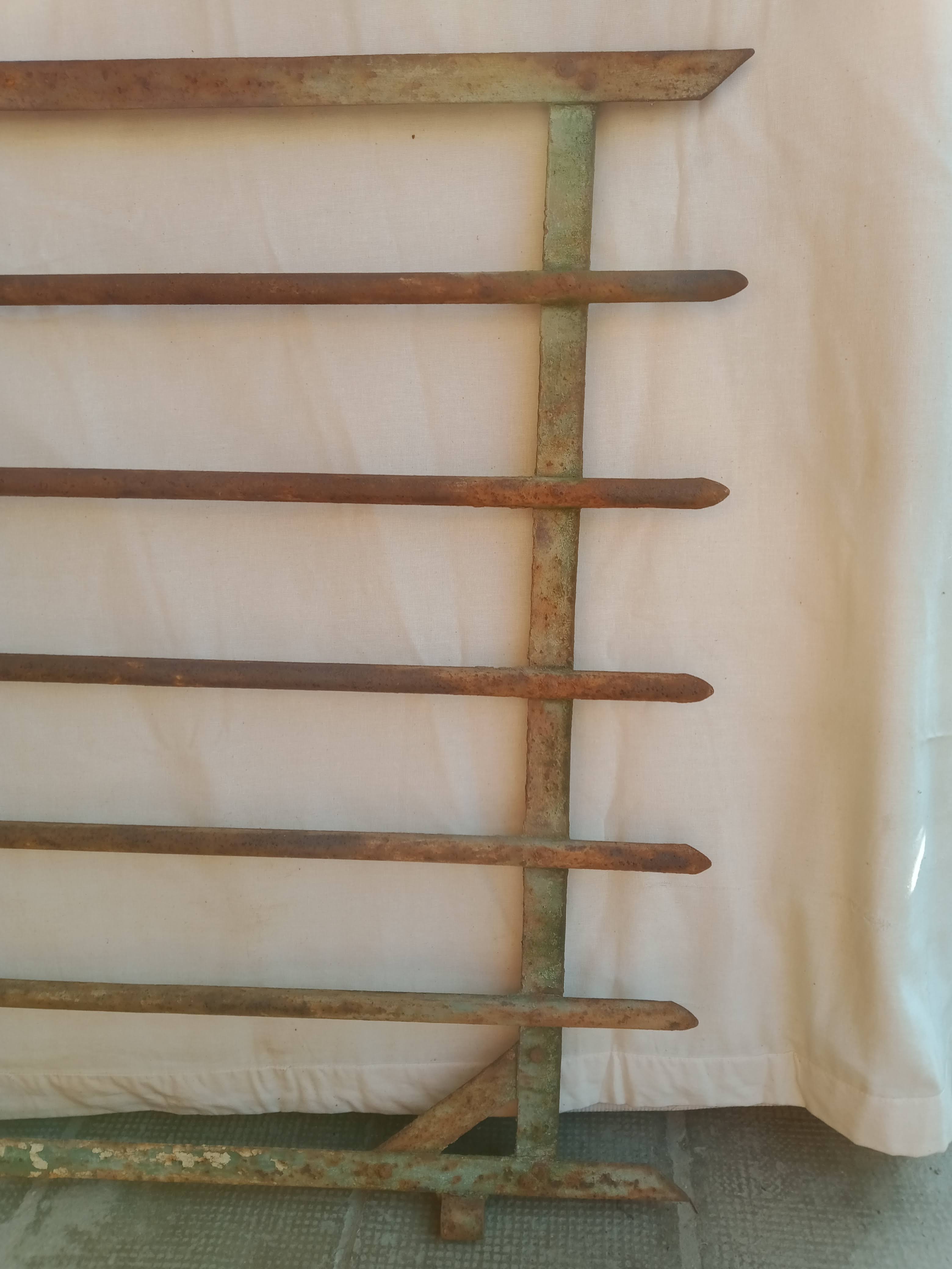 Old riveted metal gate