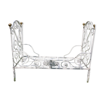 Old, wrought iron child bed, white