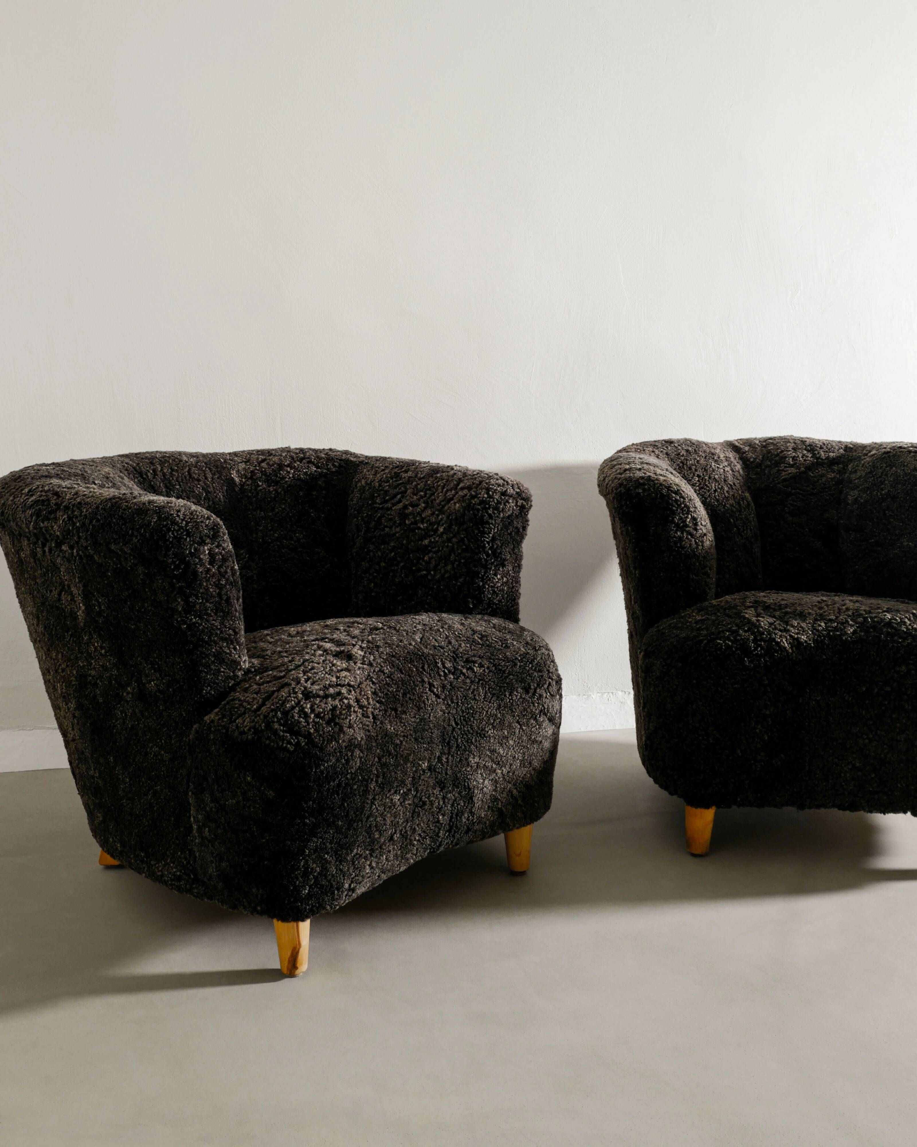 Pair of Swedish Curved Mid Century Modern Armchairs in Dark Sheepskin 1940s