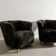 Pair of Swedish Curved Mid Century Modern Armchairs in Dark Sheepskin 1940s