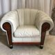 Pair of leather Chesterfield armchairs