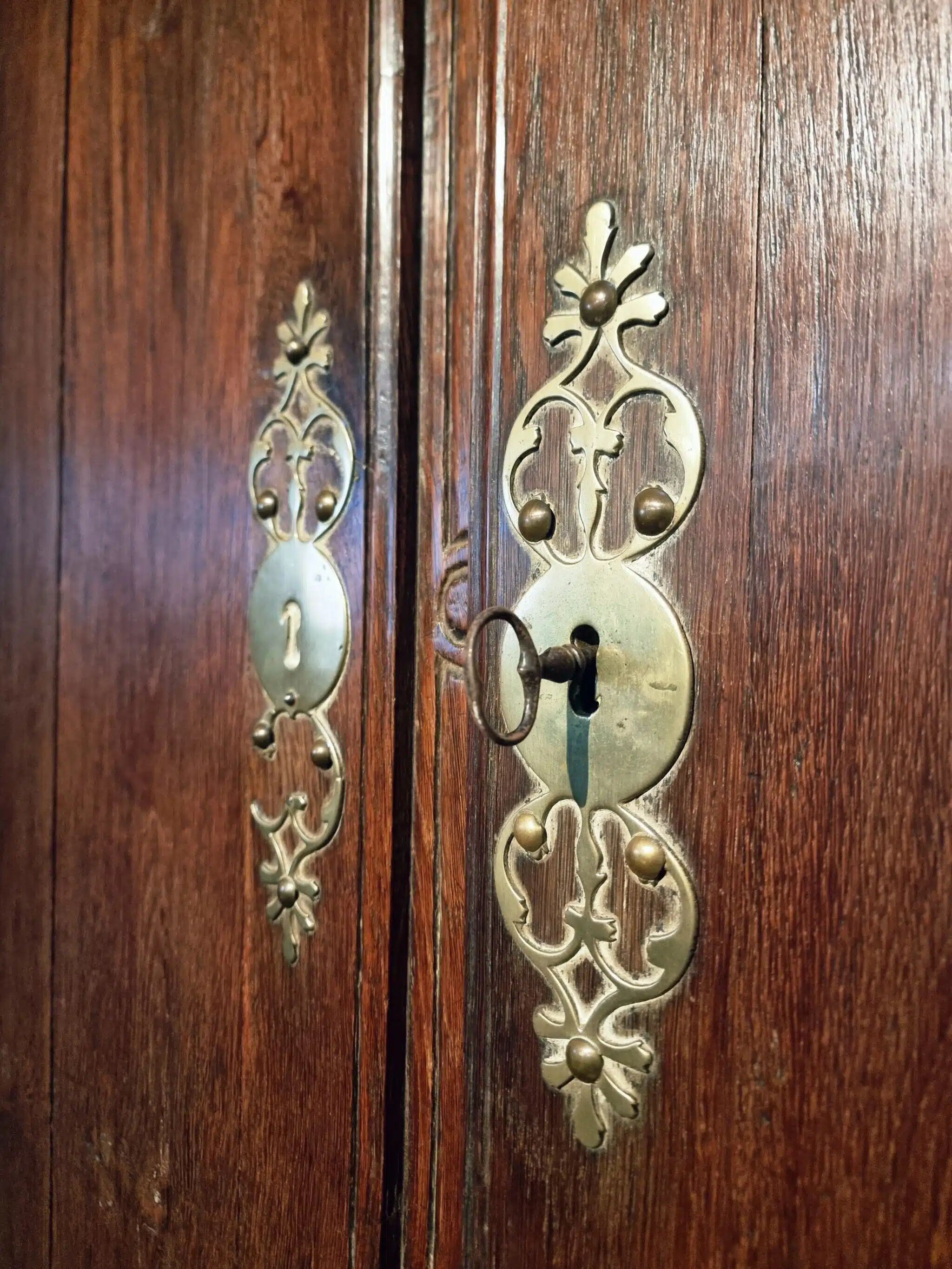 French oak armoire, late 17th - early 18th century, Louis XIV provincial style with hand-carved rosettes