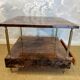 Aldo Tura side table in hazel brown tones with brass legs and bottom drawer