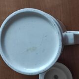 Small coffee maker with floral decoration