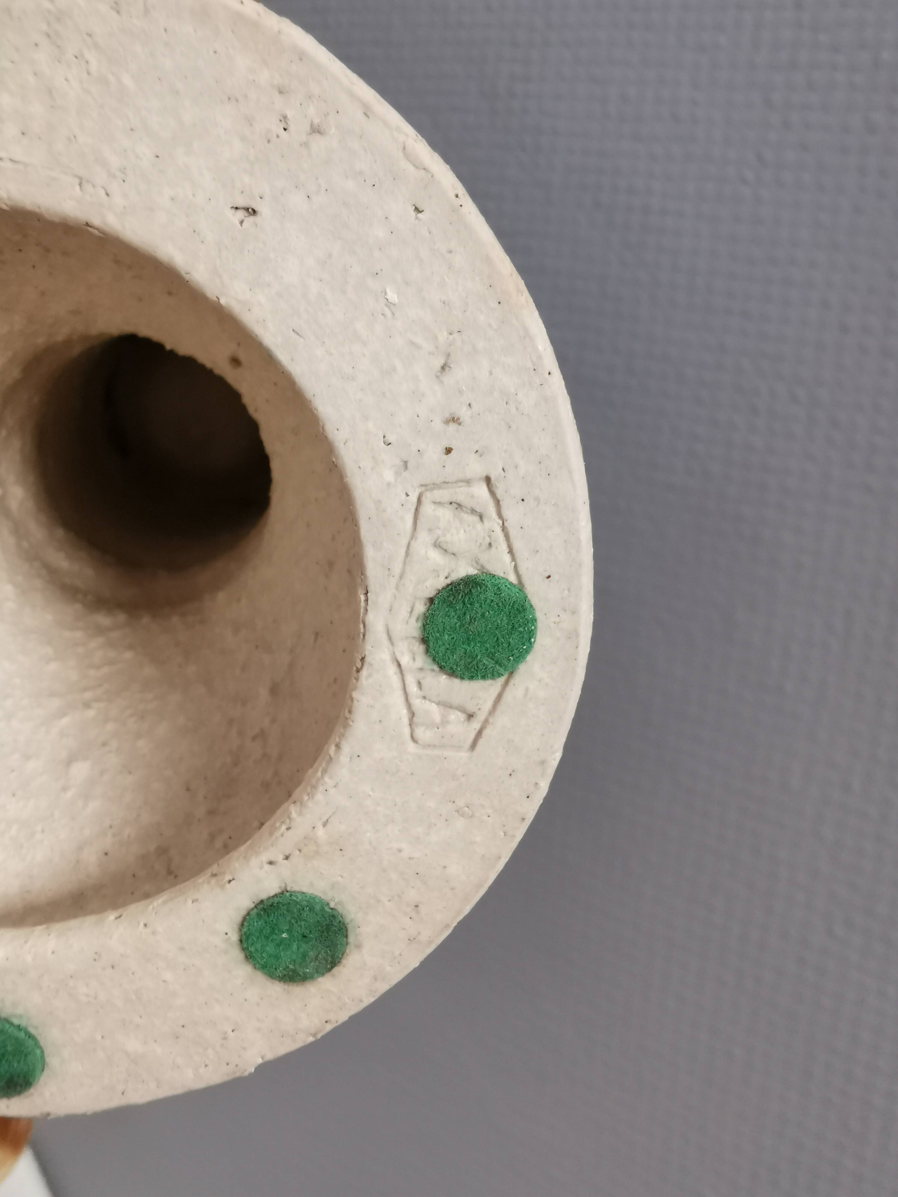 A set of ceramic candleholders by Axel Larsen for his own company, Axella