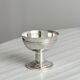 6 dessert bowls on a shiny metal stand.