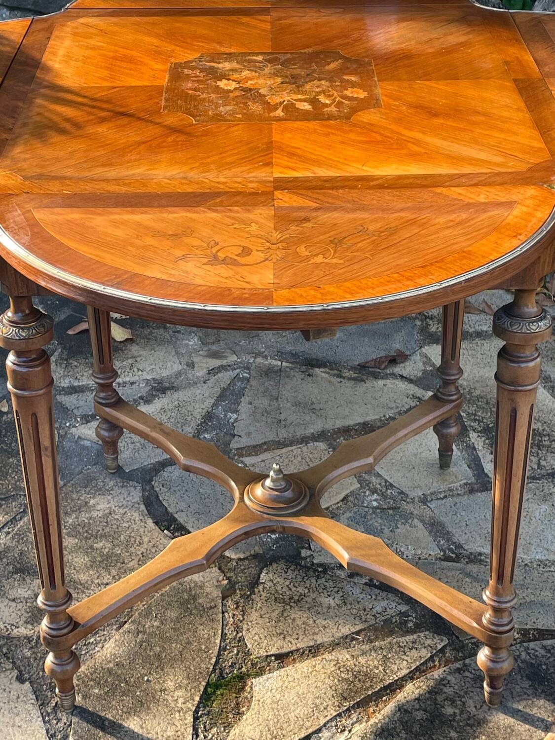Center table decorated with marquetry of leaves and flowers in Louis XVI style, 19th century period