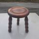 Small vintage tripod stool made of turned wood, in the style of Charles.