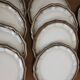 Service of 12 flat plates Salins France, taupe rim.
