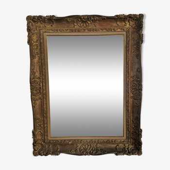 Carved and gilded wooden mirror early in the 20th century  - 96x76cm