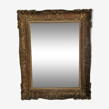 Miroir en bois sculpté et doré début du XXeme - 96x76cm