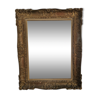 Carved and gilded wooden mirror early in the 20th century  - 96x76cm