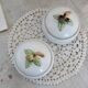 Paire de bonbonnières vintage en porcelaine motif fruits et liseré doré