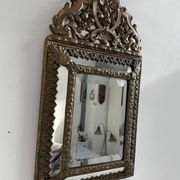 Small mirror with brass parcloses in repoussé style Louis XIV, late 19th century.