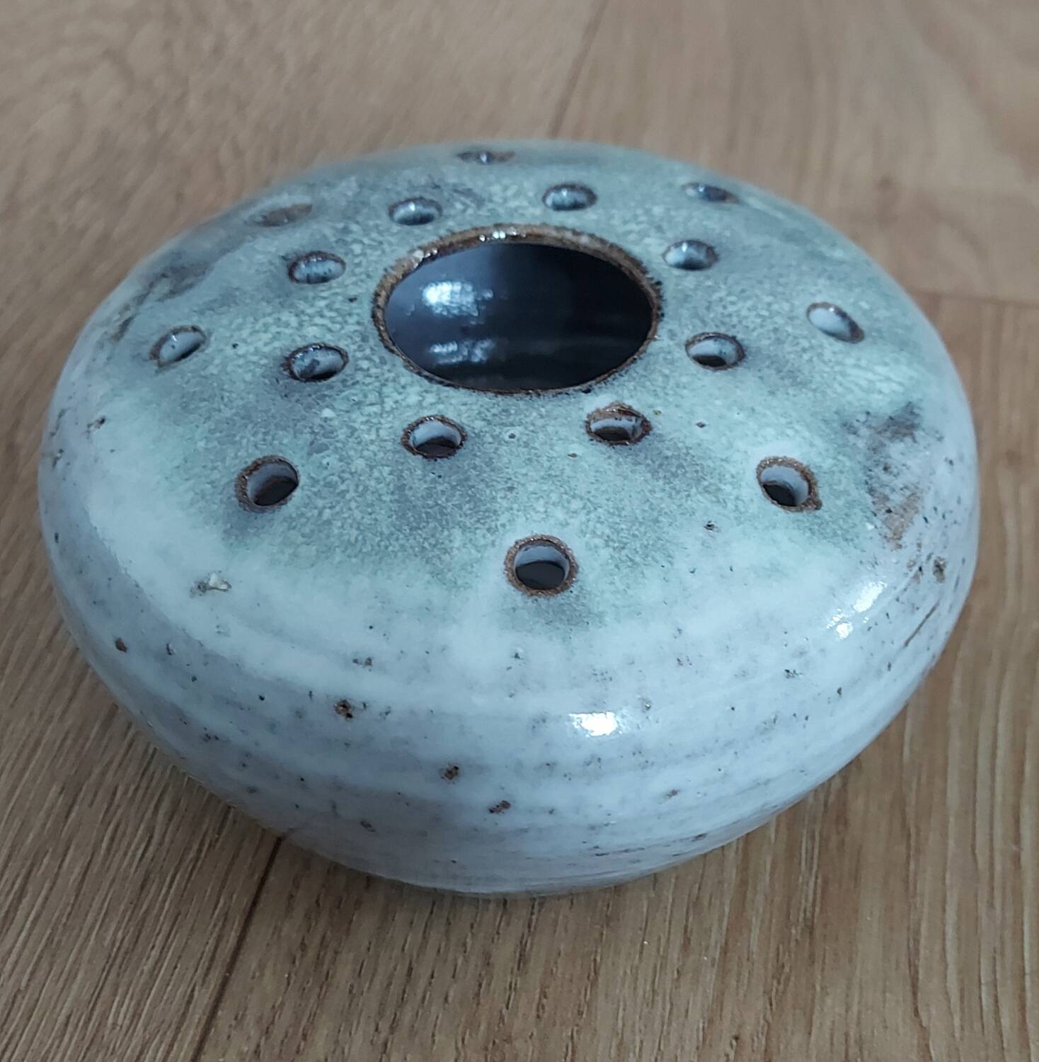 Signed ceramic flower pick