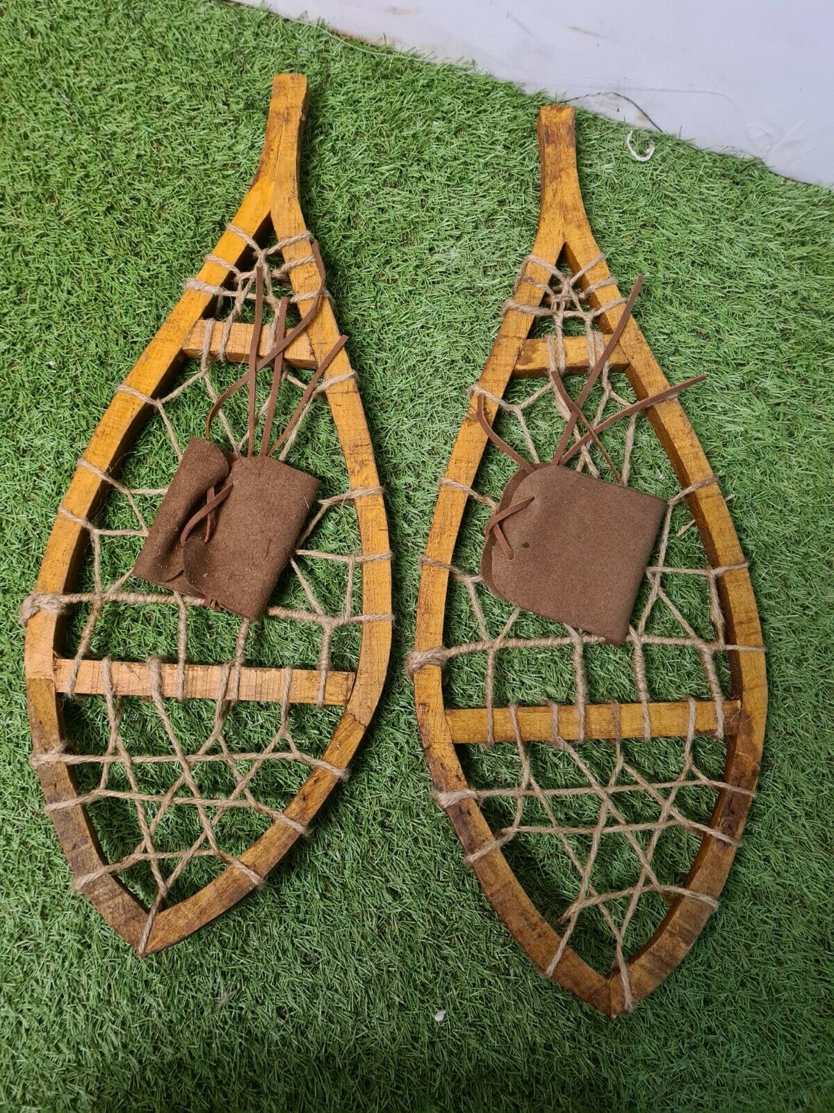 Pair of wooden snowshoes