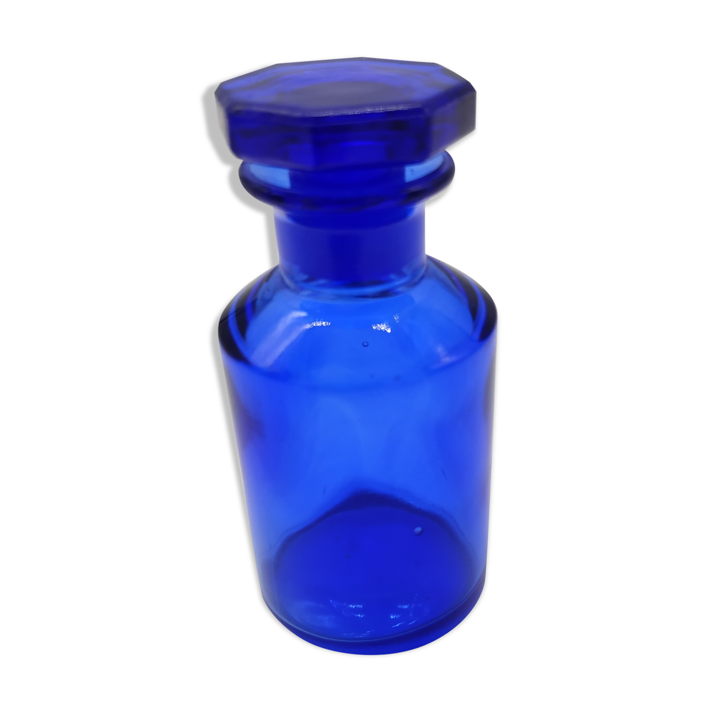 Old perfume bottle in cobalt blue glass