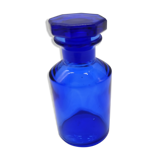 Old perfume bottle in cobalt blue glass