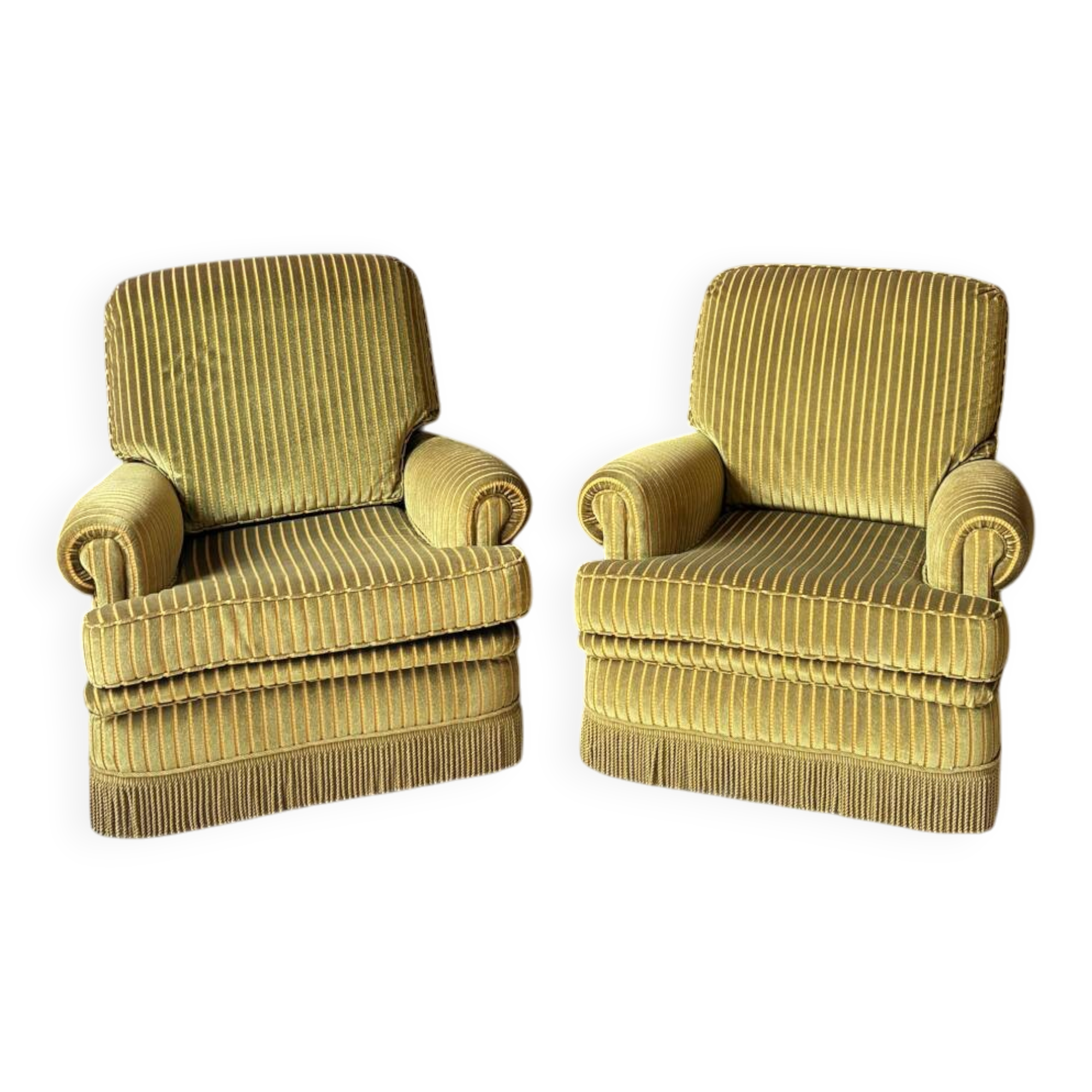 Pair of green recliner chairs