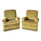 Pair of green recliner chairs