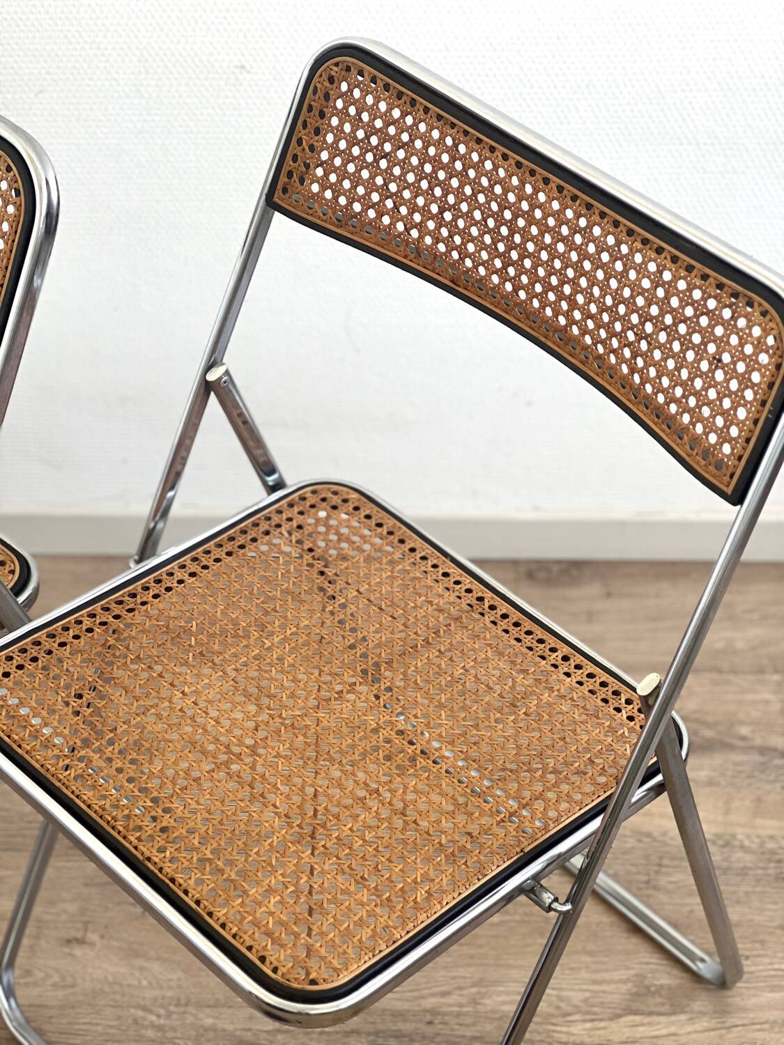 Pair of folding cane chairs