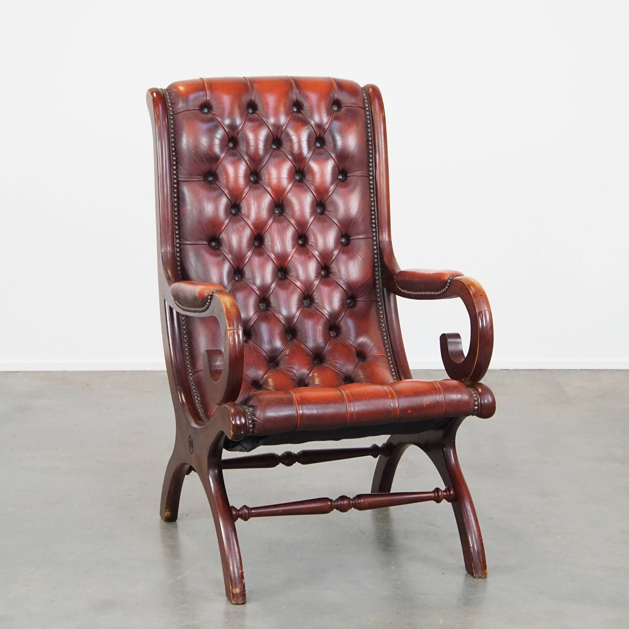 Red cowhide leather English Chesterfield armchair combined with wood
