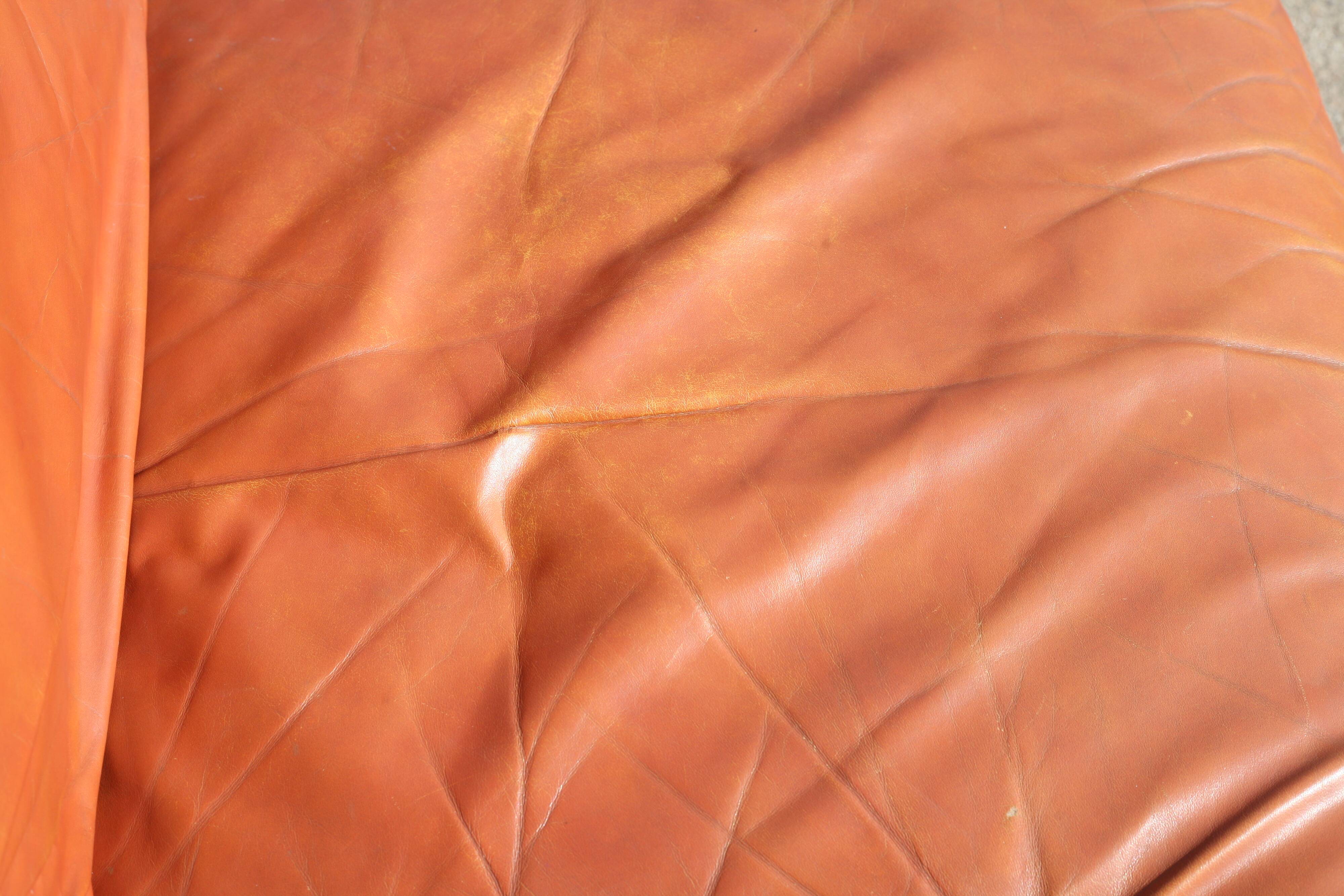 Space age sofa. Tan leather. Circa 1970