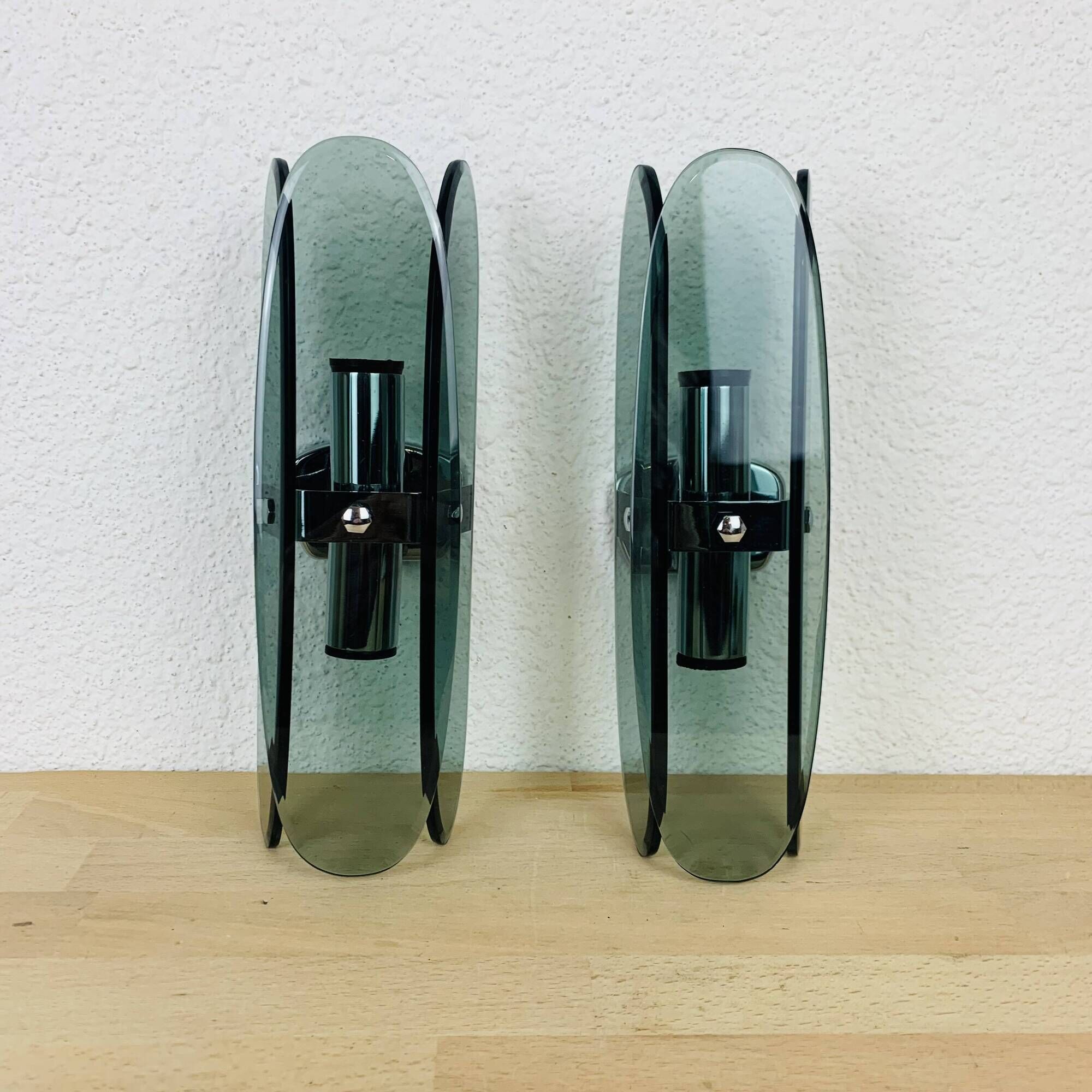 Pair of 70s smoked glass chrome wall lights