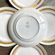 5 St Amand flat plates in yellow and gold earthenware
